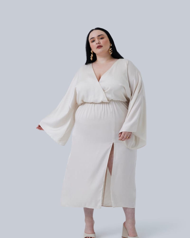 Front of a model wearing a size 0 (12) Alayiah Midi Dress in IVORY by GIA/irl. | dia_product_style_image_id:273765